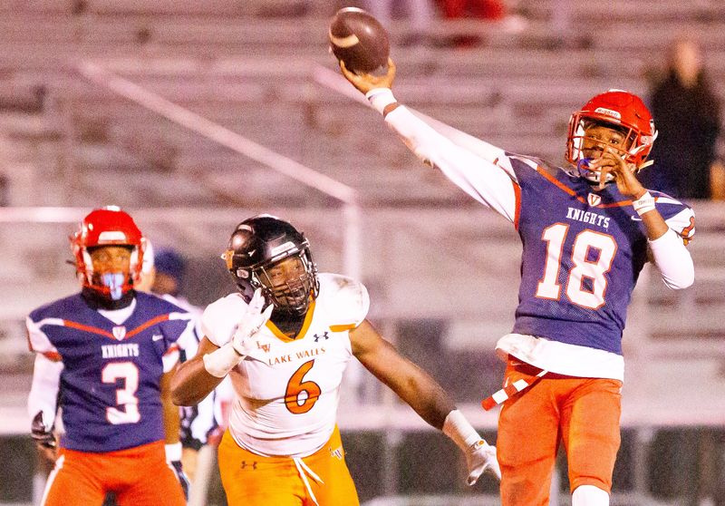 Lake Wales High School defensive end Dontavius Purdy (6) puts the pressure on Vanguard Knights Terrance Lewis (18). The Vanguard Knights hosted The Lake Wales Highlanders at Booster Stadium in Ocala, FL on Friday, November 22, 2024. [Doug Engle/Ocala Star Banner]