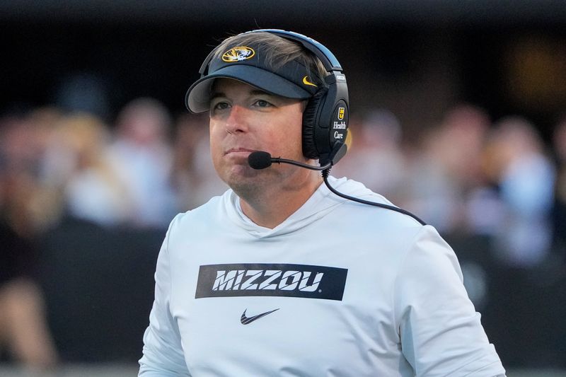 Sep 7, 2024; Columbia, Missouri, USA; Missouri Tigers head coach Eli Drinkwitz watches play against the Buffalo Bulls during the first half at Faurot Field at Memorial Stadium. Mandatory Credit: Denny Medley-Imagn Images