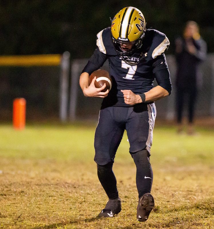 Buchholz Bobcats Keil McGriff (7) reacts after hauling in a pass for a first down. The Buchholz Bobcats hosted the Oakleaf Knights at Citizens Field in Gainesville, FL on Friday, November 29 2024 in the Class 6A-Region 1 Final. The Bobcats defeated the Knights 25-19 and advance to the final four. [Doug Engle/Ocala Star Banner]