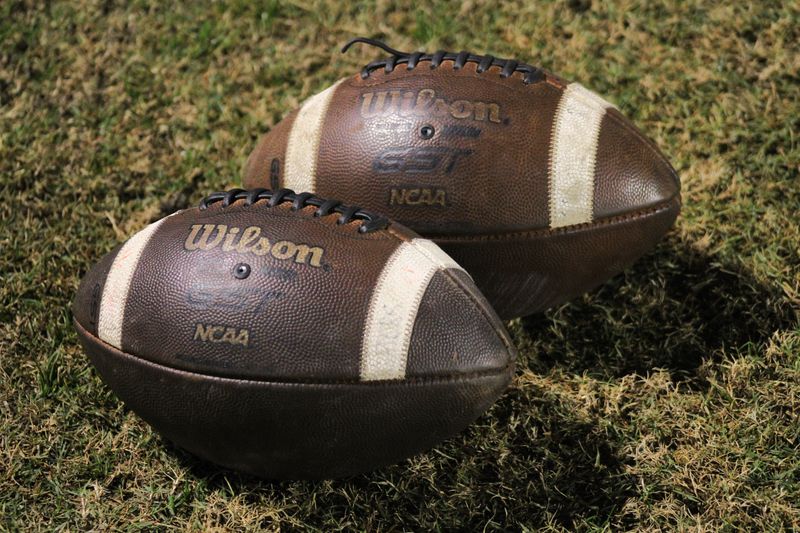 STOCK | Footballs rest on the field before an FHSAA Region 1-4A high school football final between Choctawhatchee and St. Augustine in St. Augustine, Florida, on Nov. 29, 2024. [Clayton Freeman/Florida Times-Union]