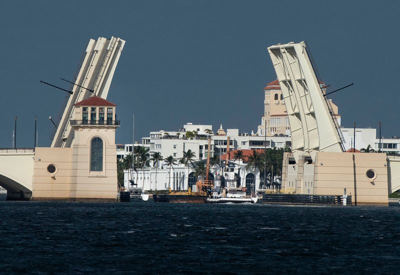 The Royal Park bridge between West Palm Beach and Palm Beach has an unscheduled opening as a Vance Construction barge travels north in the Intracoastal Waterway Dec. 12, 2024.