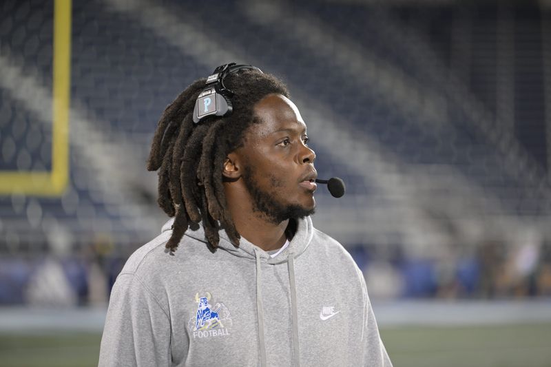 Miami Northwestern head coach Teddy Bridgewater looks on from the sideline as his team faces Raines from Jacksonville in the Class 3A state championship on Dec. 14, 2024.