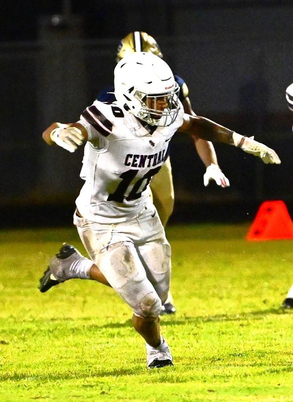 Palm Beach Central linebacker Antoine Sharp reaches for a tackle during a regular season game against West Boca.