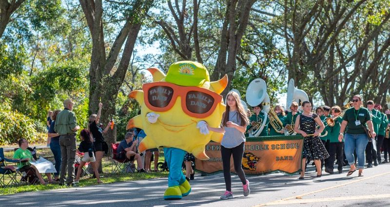 "Shades," the mascot for the Port Orange Community Trust, leads a parade to kick off the nonprofit group's annual Port Orange Family Days festival in 2022.