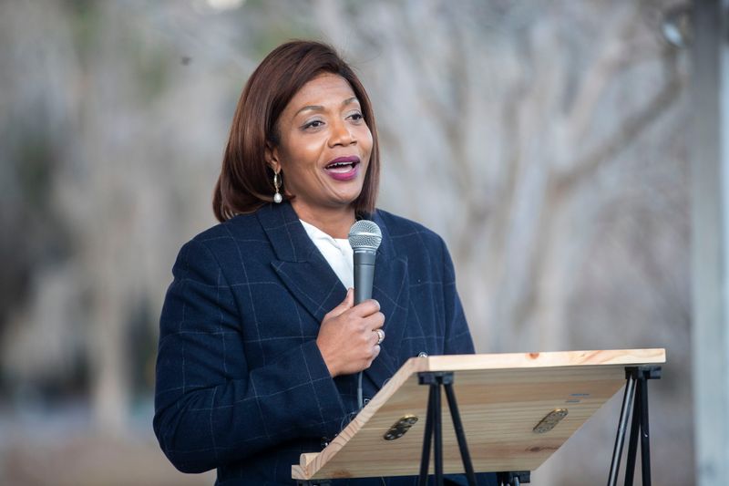 Clerk of Courts Gwen Marshall speaks at a memorial service held by the Leon County Democratic Party at Lake Ella for the late President Jimmy Carter Thursday, Jan. 9, 2025.