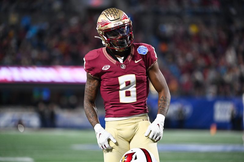 Dec 2, 2023; Charlotte, NC, USA; Florida State Seminoles defensive back Renardo Green (8) reacts after breaking up a pass in the third quarter against the Louisville Cardinals at Bank of America Stadium. Mandatory Credit:
Bob Donnan-USA TODAY Sports