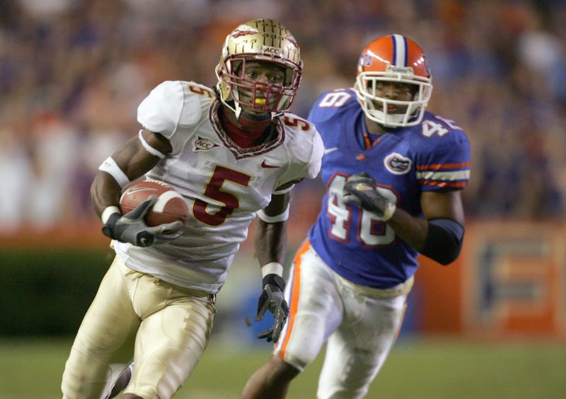 Nov 26, 2005; Gainesville, FL, USA; Florida State Seminoles wide receiver (5) Chris Davis runs from Florida Gators safety (46) Jarvis Herring during the second half at Ben Hill Griffin Stadium in Gainesville, FL. Mandatory Credit: 
Jason Parkhurst-USA TODAY Sports Copyright © 2005 Jason Parkhurst