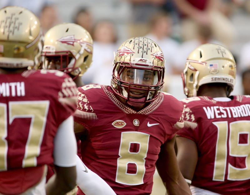 Oct 24, 2015; Atlanta, GA, USA; Florida State Seminoles defensive back Jalen Ramsey (8) greets teammates
during warmups before their game against the Georgia Tech Yellow Jackets at Bobby Dodd Stadium. Mandatory Credit: 
Jason Getz-USA TODAY Sports