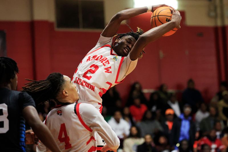 Andrew Jackson guard David Wilson (2) pulls down a rebound against Ribault in a battle of recent boys basketball final four qualifiers from Jacksonville. UNF Arena will hold the next three FHSAA championship tournaments in both boys and girls basketball.