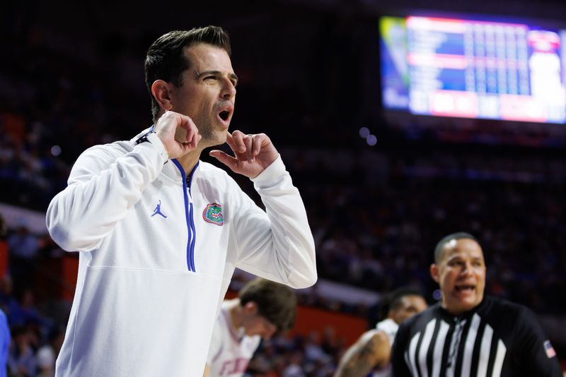 Jan 25, 2025; Gainesville, Florida, USA; Florida Gators head coach Todd Golden gestures towards a referee against the Georgia Bulldogs during the first half at Exactech Arena at the Stephen C. O'Connell Center. Mandatory Credit: Matt Pendleton-Imagn Images