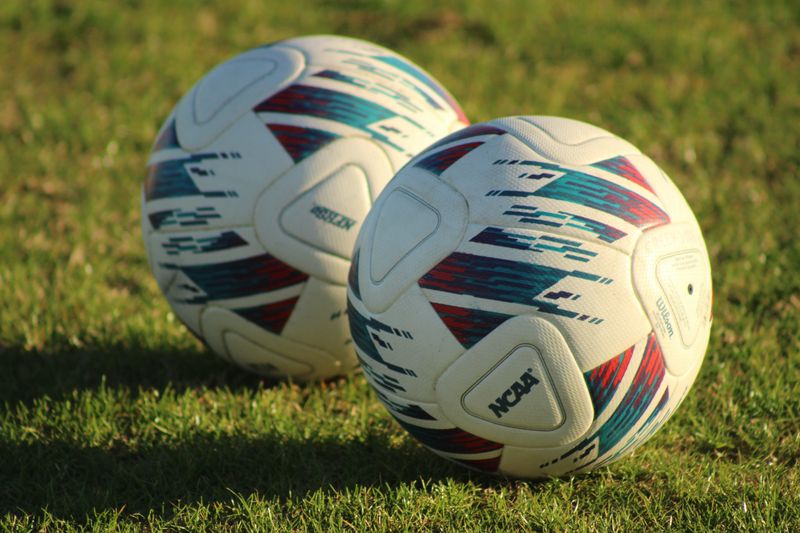 Soccer balls are pictured on the field before an FHSAA Region 1-6A high school boys soccer regional quarterfinal between Sanford Seminole and Creekside in St. Johns, Florida, on Feb. 4, 2025. [Clayton Freeman/Florida Times-Union]