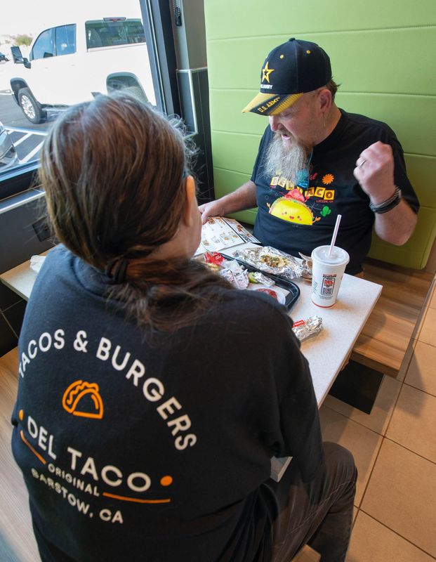 Michelle and Ray Niedert, of Milton, eat at Del Taco as the restaurant opens at 404 Brent Lane in Pensacola on Friday, Feb. 7, 2025. Michelle and Ray are long time Del Taco fans from when they lived near the original restaurant in California.