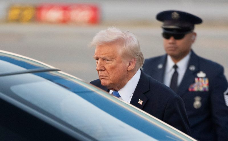 President Donald Trump arrives at Palm Beach International Airport in February 2025. Trump has a net worth of $5.1 billion on the 2025 Forbes list of the world's billionaires.