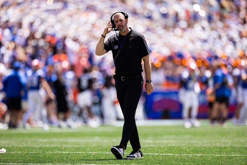 Florida Gators head coach Billy Napier walks during the first half at the Orange and Blue spring football game at Steve Spurrier Field at Ben Hill Griffin Stadium in Gainesville, FL on Saturday, April 13, 2024. [Matt Pendleton/Gainesville Sun]