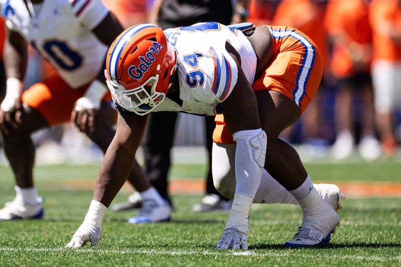 Florida Gators edge rusher Tyreak Sapp (94) waits for the snap during the second half at the Orange and Blue spring football game at Steve Spurrier Field at Ben Hill Griffin Stadium in Gainesville, FL on Saturday, April 13, 2024. [Matt Pendleton/Gainesville Sun]