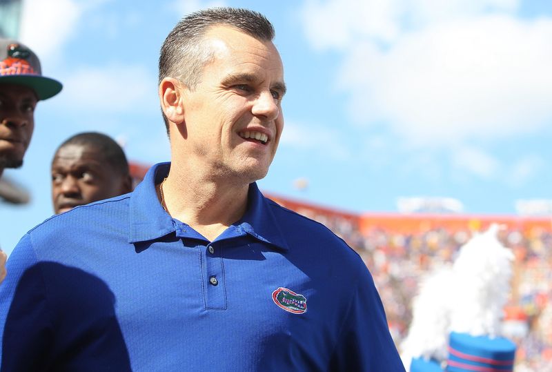 October 6, 2012; Gainesville FL, USA; Florida Gators basketball head coach Billy Donovan watches on the sidelines during the first quarter against the LSU Tigers at Ben Hill Griffin Stadium. Mandatory Credit: Kim Klement-USA TODAY Sports