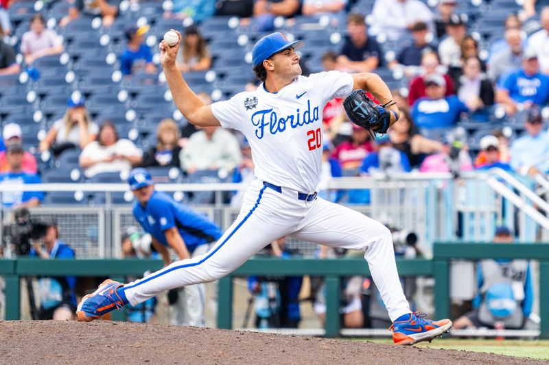Jun 19, 2024; Omaha, NE, USA; Florida Gators pitcher Jake Clemente (20) pitches against the Kentucky Wildcats during the sixth inning at Charles Schwab Field Omaha. Mandatory Credit: Dylan Widger-USA TODAY Sports