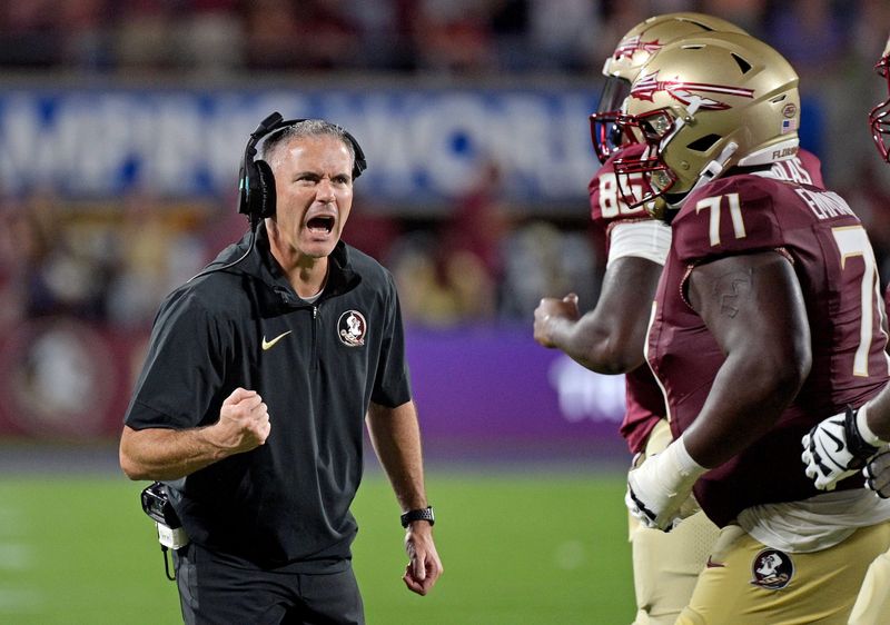 Sep 3, 2023; Orlando, Florida, USA; Florida State Seminoles head coach Mike Norvell is excited during the fourth quarter against the Louisiana State Tigers at Camping World Stadium. Mandatory Credit:
Melina Myers-USA TODAY Sports
