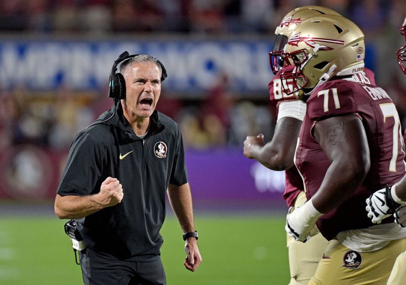 Sep 3, 2023; Orlando, Florida, USA; Florida State Seminoles head coach Mike Norvell is excited during the fourth quarter against the Louisiana State Tigers at Camping World Stadium. Mandatory Credit: 
Melina Myers-USA TODAY Sports