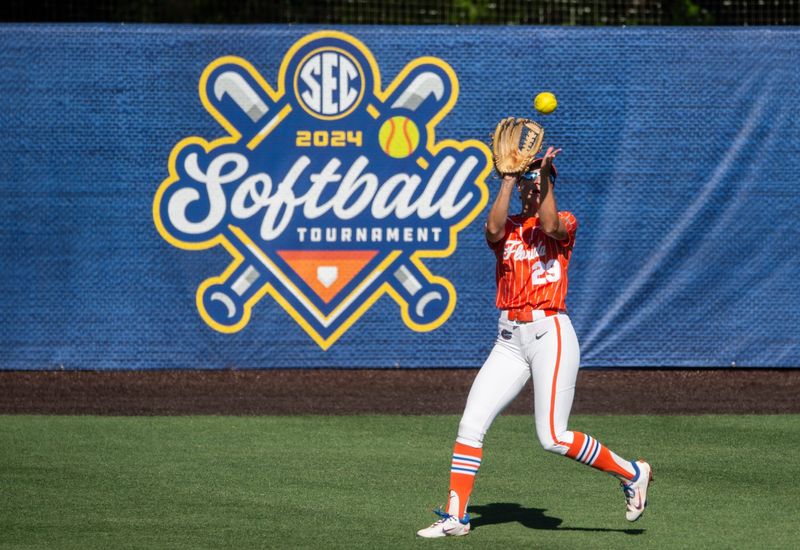Florida Gators outfielder Katie Kistler (29) catches a fly ball as Florida Gators and Missouri Tigers face of in the SEC softball tournament championship game at Jane B. Moore Field in Auburn, Ala., on Saturday, May 11, 2024.
