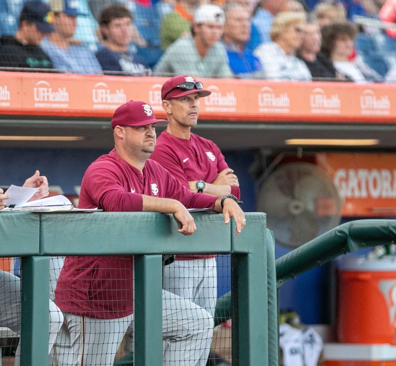Florida StateÃ•s head coach Link Jarrett watches from the dugout in the game against Florida, Tuesday, April 11, 2023, at Condron Family Baseball Park in Gainesville, Florida. The Gators beat the Seminoles 5-3. 
[Cyndi Chambers/ Gainesville Sun]