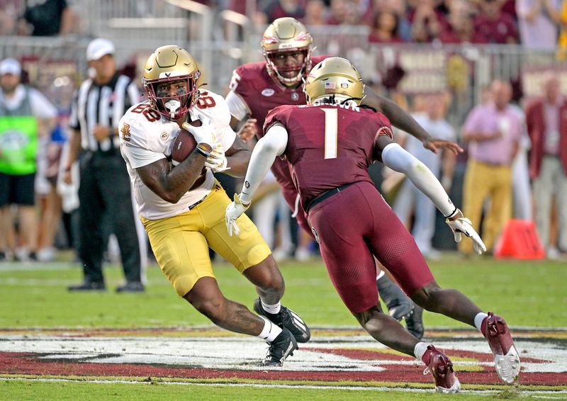 Sep 2, 2024; Tallahassee, Florida, USA; Boston College Eagles tight end Kamari Morales (88) runs the ball against Florida State Seminoles defensive back Shyheim Brown (1) during the first quarter at Doak S. Campbell Stadium. Mandatory Credit:
 Melina Myers-USA TODAY Sports