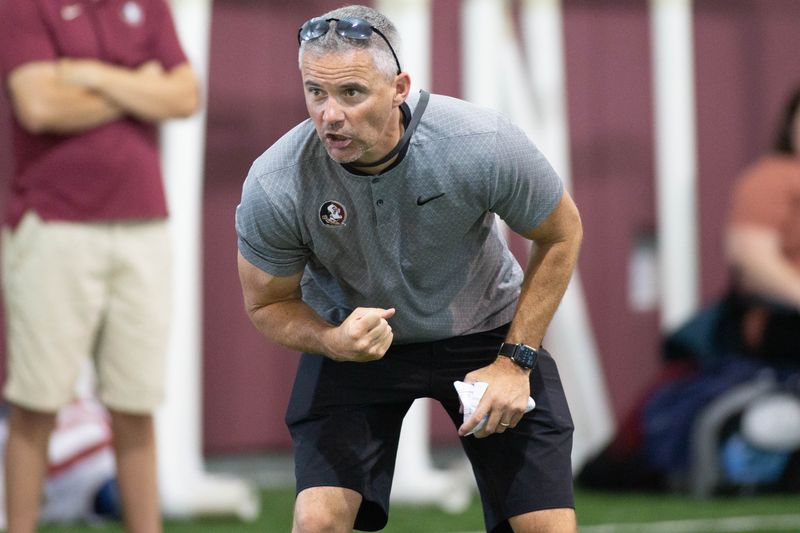 Florida State University football head coach Mike Norvell makes the rounds at his Big Man Camp held at FSU's indoor practice facility Wednesday, June 9, 2021.
© Tori Lynn Schneider/Tallahassee Democrat via Imagn Content Services, LLC