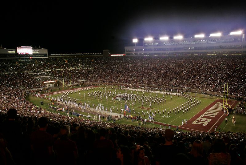 Nov 19, 2011; Tallahassee, FL, USA; A general view of Doak Campbell Stadium, with the Florida State Seminoles Marching Chiefs on the field, before the start of the Florida State Seminoles football game against the Virginia Cavaliers. Mandatory Credit:
 Phil Sears-USA TODAY Sports