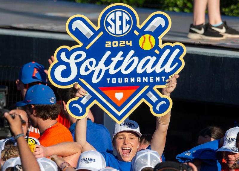 Florida Gators players celebrate victory during the SEC softball tournament championship game at Jane B. Moore Field in Auburn, Ala., on Saturday, May 11, 2024. Florida Gators defeated Missouri Tigers 6-1.
