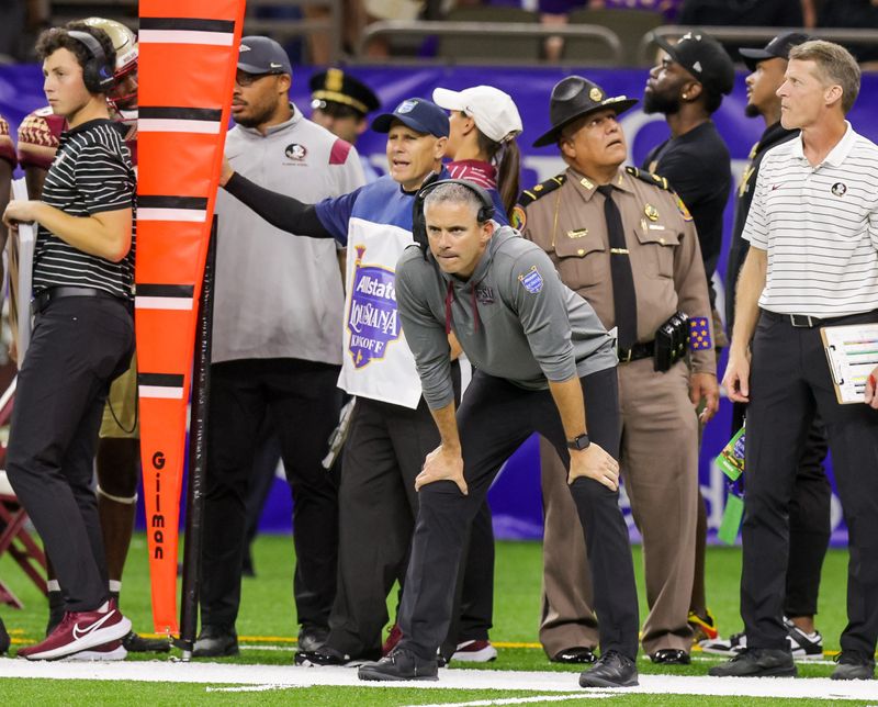 Sep 4, 2022; New Orleans, Louisiana, USA; Florida State Seminoles head coach Mike Norvell looks on against the LSU Tigers during the second half of the game at Caesars Superdome. Mandatory Credit: 
Stephen Lew-USA TODAY Sports