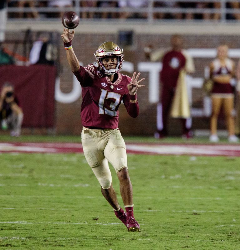 Florida State Seminoles quarterback Jordan Travis (13) passes to a teammate. The Notre Dame Fighting Irish lead the Florida State Seminoles 17-14 at the half Sunday, Sept. 5, 2021.

Fsu V Notre Dame564