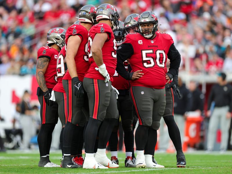 Dec 24, 2023; Tampa, Florida, USA; Tampa Bay Buccaneers defensive tackle Vita Vea (50) lines up against the Jacksonville Jaguars in the second quarter at Raymond James Stadium. Mandatory Credit: Nathan Ray Seebeck-USA TODAY Sports
