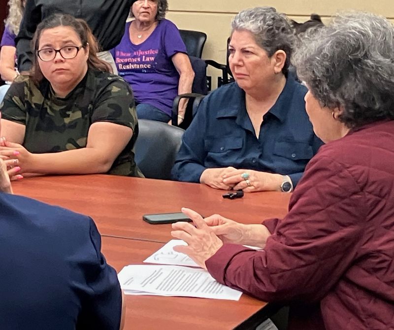 Shelley Gottsagen of Boynton Beach (center) has reasons to worry about looming cuts to Medicaid. She explained at a recent roundtable by Rep. Lois Frankel, D-West Palm Beach, (right) that both her son and her mother rely on it.