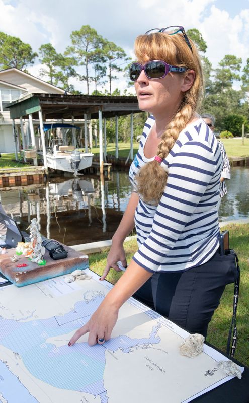 Shana Alford, owner of Avalon Aquaculture, talks about the impact that a proposal by the state of Florida to close additional areas of Escambia and East Bays to the harvest of oysters would have on her and other businesses in the area during a press conference in Milton on Tuesday, Aug. 30, 2022.