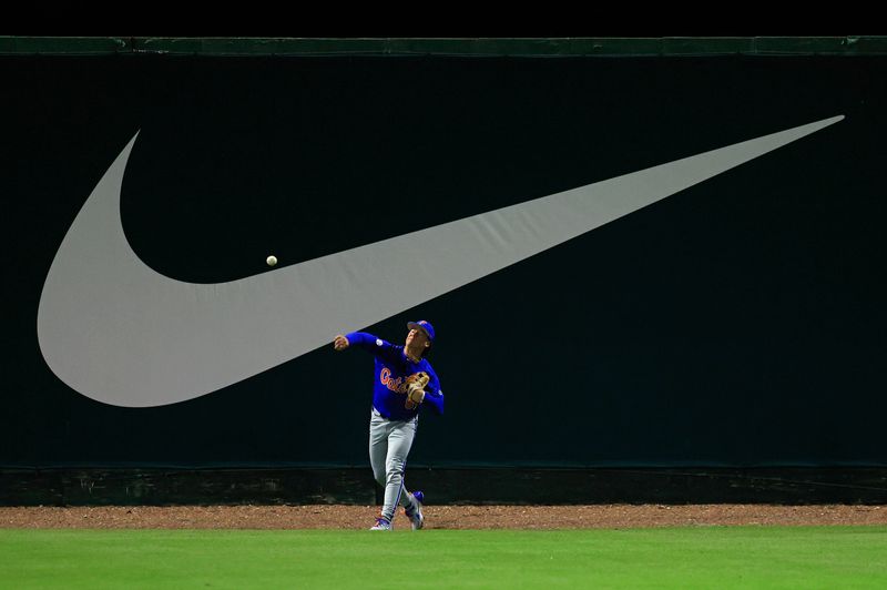 Florida utility Blake Cyr (5) throws the ball during the third inning of an NCAA baseball matchup Monday, Feb. 17, 2025 at Jacksonville University in Jacksonville, Fla. Florida defeated Jacksonville 10-4. [Corey Perrine/Florida Times-Union]
