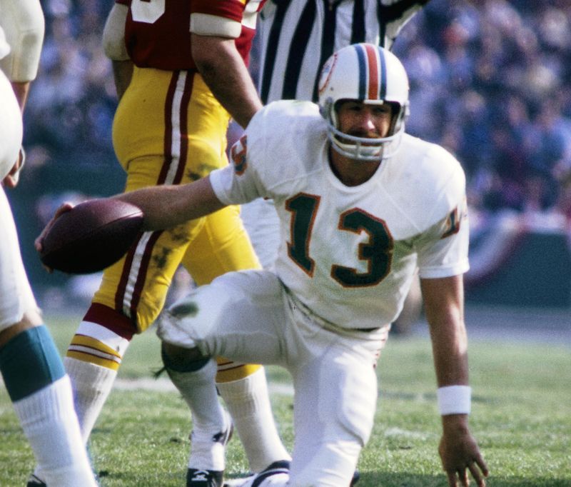 Jan 14, 1973; Los Angeles, CA, USA; FILE PHOTO; Miami Dolphins safety Jake Scott (13) against the Washington Redskins in Super Bowl VII at the Los Angeles Coliseum. The Dolphins defeated the Redskins 14-7 completing a 17-0 undefeated season. Mandatory Credit: Darryl Norenberg-USA TODAY Sports
