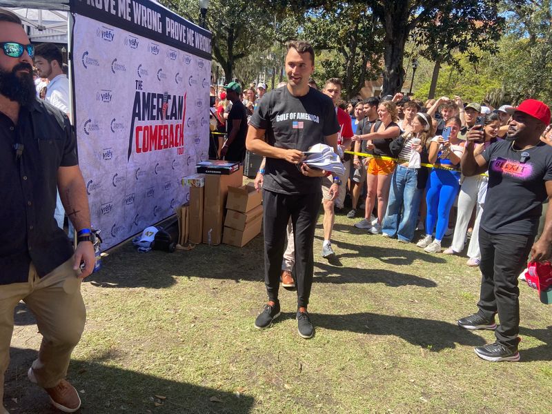 Charlie Kirk, wearing a "Gulf of America" T-shirt, spoke Thursday at the Plaza of the Americas on the University of Florida campus in Gainesville.