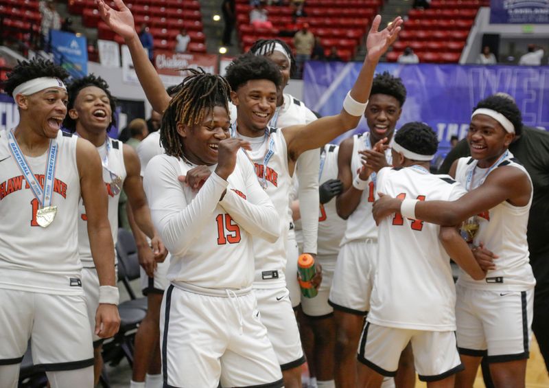 Hawthorne players celebrate a state title win. Hawthorne HS defeated Crossroad Academy 59-38 in the FHSAA Rural State Boys basketball Championship game at the RP Funding Center in Lakeland Fl. February 28th 2025. Photos special to the Ledger / Calvin Knight