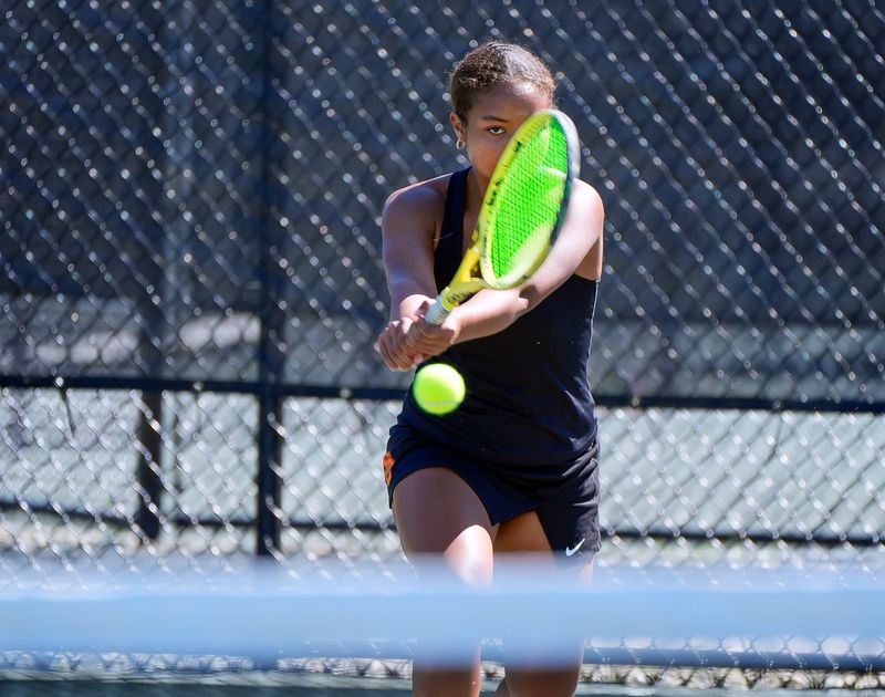 Spruce Creek No. 1 singles player Giselle Adekunle hits a backhand return during the Five Star Conference tennis tournament at the Florida Tennis Center in Daytona Beach, Friday, March 7, 2025.