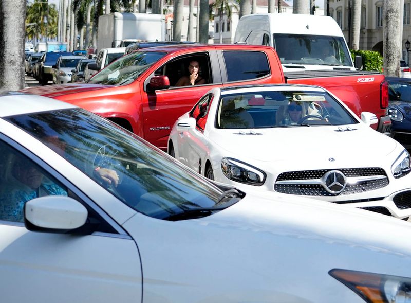 Road closures of South Ocean Boulevard near Mar-a-Lago in Palm Beach and South Flagler Drive for the Palm Beach International Boat Show in West Palm Beach add to the gridlock of westbound traffic on Royal Palm Way this past March.