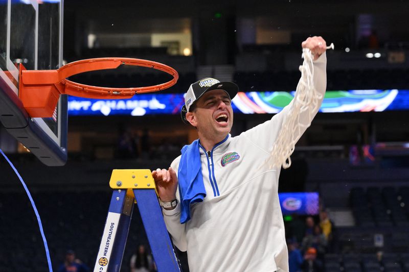 Mar 16, 2025; Nashville, TN, USA; Florida Gators head coach Todd Golden cuts the net after winning the 2025 SEC Championship Game at Bridgestone Arena. Mandatory Credit: Steve Roberts-Imagn Images
