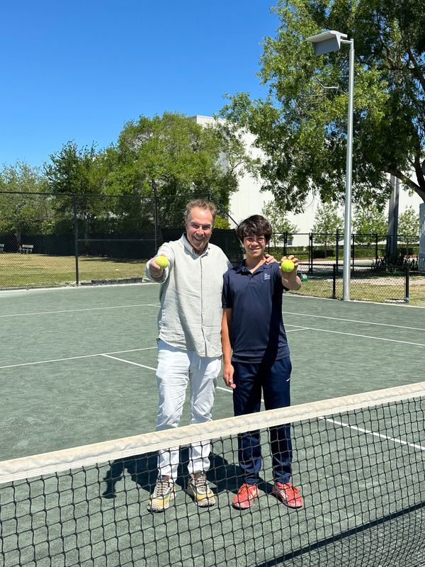 Jeff Greene and son Malcolm Greene, who is the No. 1 singles tennis player for the Greene School