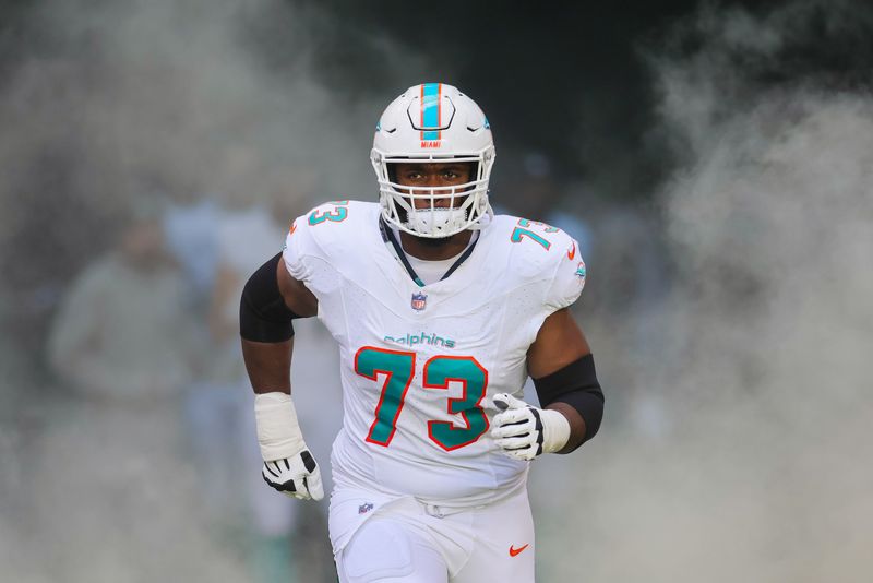 Dec 17, 2023; Miami Gardens, Florida, USA; Miami Dolphins guard Austin Jackson (73) enters the field to take on the New York Jets at Hard Rock Stadium. Mandatory Credit: Sam Navarro-USA TODAY Sports