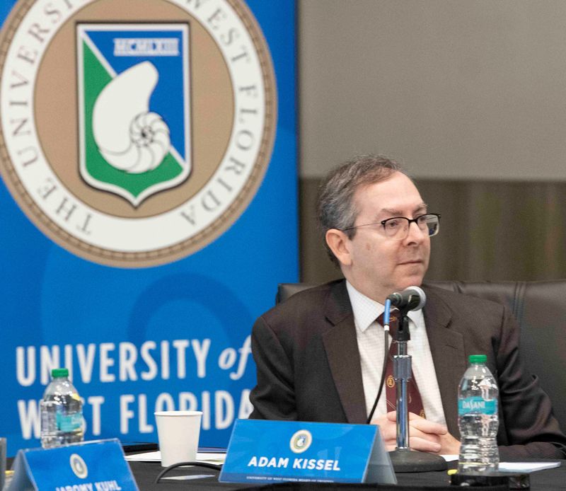 The University of West Florida Board of Trustees member Adam Kissel listens to a presentation by President Martha Saunders during a full meeting of the group on Thursday, March 20, 2025.