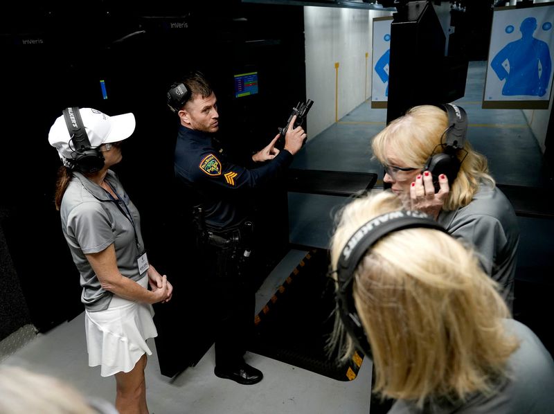 Sgt. Robert Mastrangelo instructs Rachel Supple, from left, and Susan Wright at the firing range at the Palm Beach Police station March 5, 2025 for the Safeguard Palm Beach Police and Fire Citizen’s Academy.