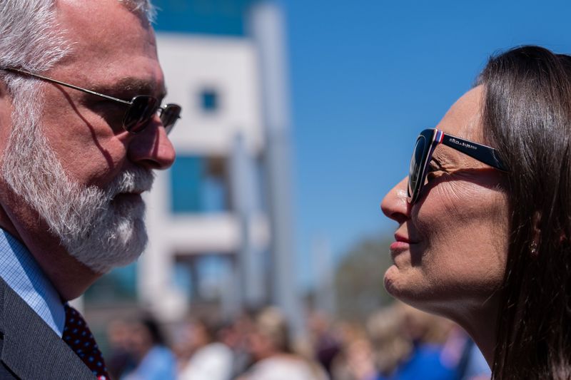 Senate President Ben Albritton, left, talks with the Florida Democratic Party Chairwoman Nikki Fried before Gov. Ron DeSantis holds a press conference in Tallahassee, Florida on Tuesday, March 25, 2025.