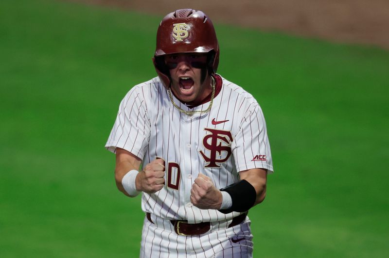 Florida St. catcher Jaxson West (20) reacts to being walked during the ninth inning of an NCAA college baseball matchup Tuesday, March 25, 2025 at VyStar Ballpark in Jacksonville, Fla. FSU rallied to defeat UF 8-4 off a walk-off grand slam from Alex Lodise in the ninth inning. [Corey Perrine/Florida Times-Union]