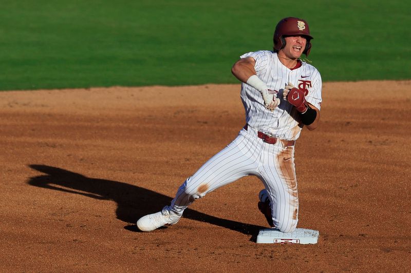 Florida St. infielder Alex Lodise (1) reacts to his double at second base during the first inning of an NCAA college baseball matchup Tuesday, March 25, 2025 at VyStar Ballpark in Jacksonville, Fla. FSU rallied to defeat UF 8-4 off a walk-off grand slam from Alex Lodise in the ninth inning. [Corey Perrine/Florida Times-Union]
