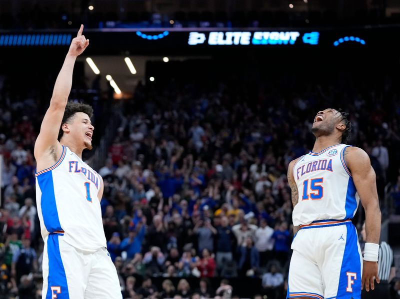 Mar 29, 2025; San Francisco, CA, USA; Florida Gators guard Walter Clayton Jr. (1) and guard Alijah Martin (15) celebrate defeating the Texas Tech Red Raiders during the West Regional final of the 2025 NCAA tournament at Chase Center. Mandatory Credit: Kyle Terada-Imagn Images