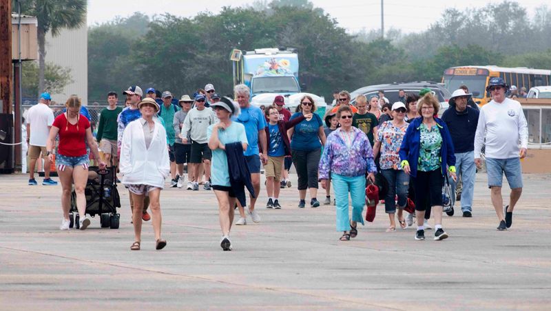 Thousand of Blue Angels fans gathered behind the National Naval Aviation Museum on Wednesday, April 2, to watch the Navy flight demonstration squadron's first public practice of the 2025 season. However, poor visibility over NAS Sherman Field kept the team grounded.